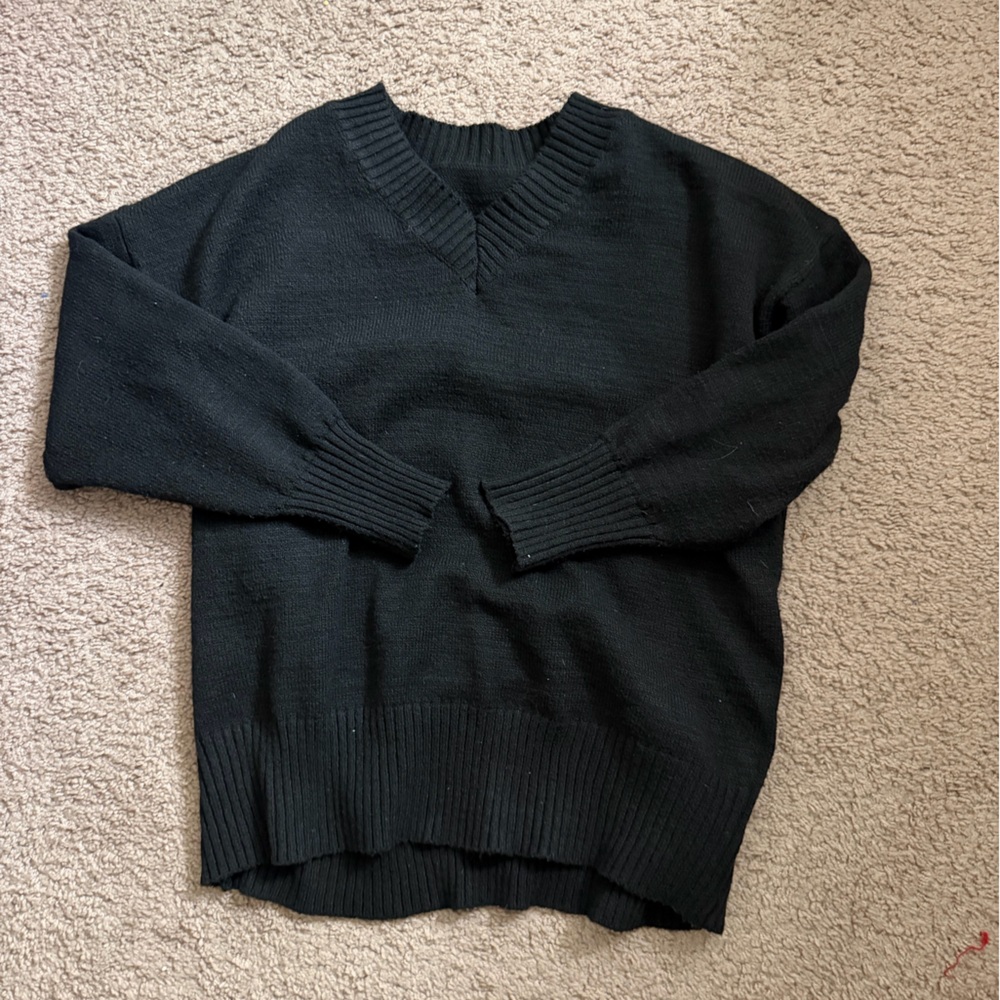 SHEIN Black V-neck sweater with a classic look